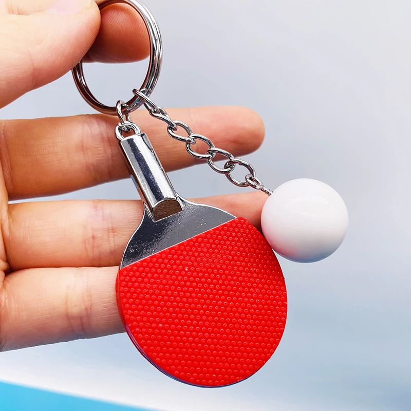 Table Tennis Olympics - 7色の可愛い卓球ラケット型ペンダント。お土産や卓球ボールのキーホルダー、スポーツファン向けのキーリング、ギフト、装飾品として最適。